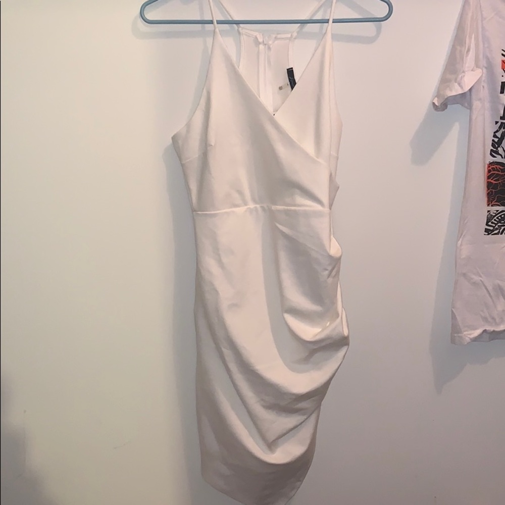 Asymmetrical white scrunched dress